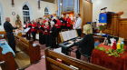 The choir performs