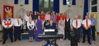 The choir with soloist Hannah Pascoe and accompanist