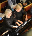 Alison and Katrina play a duet.