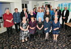 Choir members pose for a formal photo